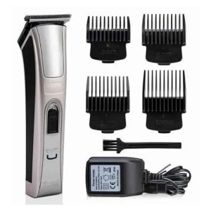 Kemei KM-5017 hair clipper with 3, 6, 9 and 12 mm guide combs, cleaning brush and charger